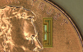 Radio-on-a-chip sitting on a small portion of a penny
