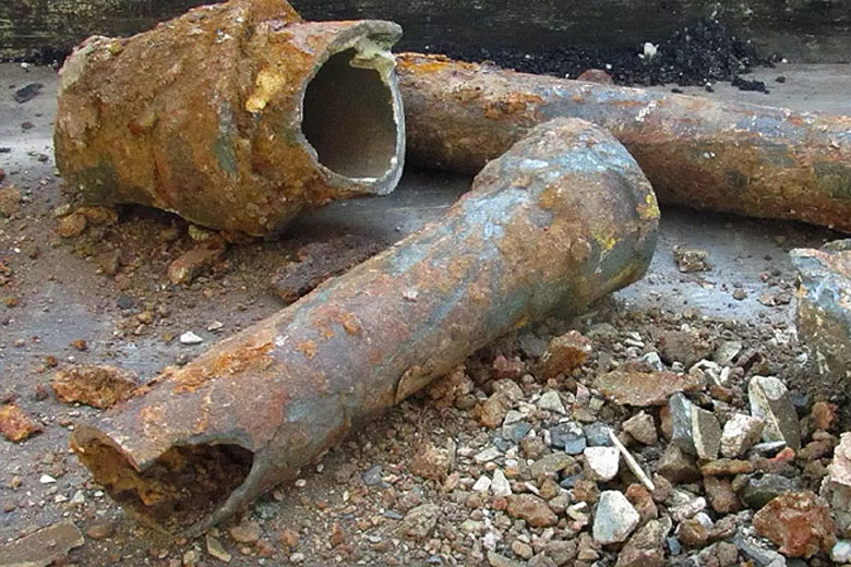 Corroded pipeline removed from below street. / Photo courtesy of Rob Jackson