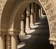 photo of archway and columns on campus