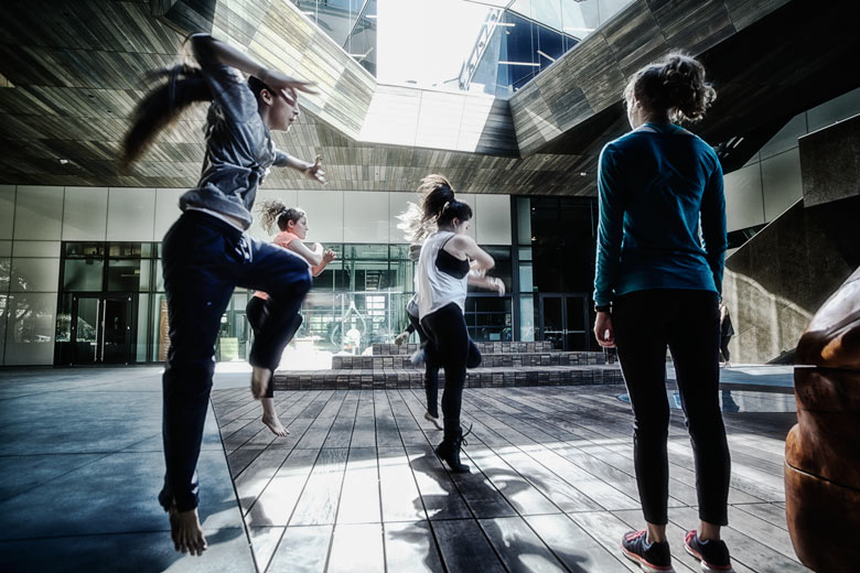 dancers rehearsing in courtyard of McMurtry Building / Jamie Lyons