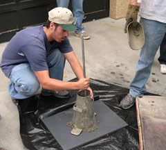 Students pouring concrete for testing