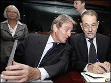 French Foreign Minister Bernard Kouchner (left) speaks to EU foreign policy chief Javier Solana in Brussels on 8 December