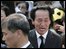 A man weeps at Roh Moo-hyun's funeral at the Seoul City Hall Plaza, 29 May  