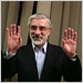 Protesters, one holding a picture of the presidential candidate Mir Hussein Moussavi, filled Tehran again on Wednesday.
