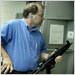 Ken Pagano, the pastor at New Bethel Church, prepared to try a Heckler & Koch MP5 submachine gun at a shooting range.