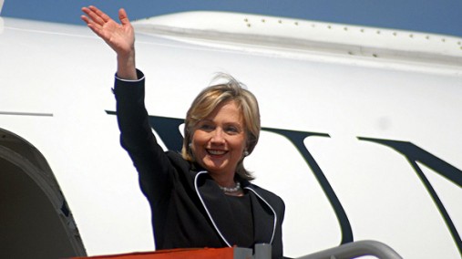 Secretary Clinton waves near plane in Guatemala City, March 5, 2010. [State Department Photo]
