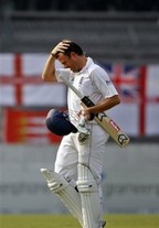 England's Graeme Swann leaves the field after losing his wicket against Bangladesh on the third day of their second test cricket match in Dhaka, Bangladesh, Monday, March 22, 2010.
