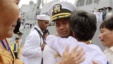U.S. navy officer Michael "Vannak Khem" Misiewicz becomes emotional as he embraces his aunt Samrith Sokha, 72, at Cambodian coastal international sea port of Sihanoukville, file photo. 