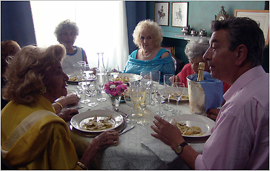 Gianni Di Gregorio, foreground, with, clockwise from his left, Valeria De Franciscis, Maria Calì, Luigi Marchetti, Marina Cacciotti and Grazia Cesarini Sforza in “Mid-August Lunch.”