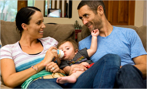 Amanda Beard with her husband, Sacha Brown, and their son, Blaise. She said she had struggled to match the expectations of her public image.