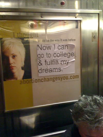 Ad reads: Abortion changes you, sticker put over ad reads: Now I can go to college and fulfill my dreams