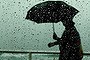 NCH NEWS 
Wet weather in Newcastle. Picture shows a couple huddle under a umbrella. The breakwall, near Nobbys Beach.
28th January 2013 Newcastle
NCH NEWS PIC JONATHAN CARROLL