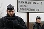 French gendarmes secure the roundabout near the scene of the hostage taking in Dammartin-en-Goele, northeast of Paris.