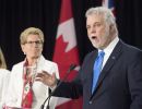 La première ministre de l’Ontario, Kathleen Wynne, écoutait attentivement Philippe Couillard lundi.