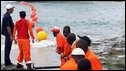 Mombasa workers haul in an undersea cable, June 09