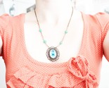 Teal matryoshka cameo necklace