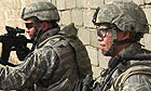 Soldiers from the 3rd battalion keep watch during a patrol in al-Hadar