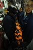 Seaman Noelle Pridgen looks ahead as she leads stretcher bearers to the medical ward.