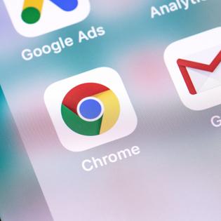 A close-up of the Google Chrome web browser app icon on a cell phone screen.