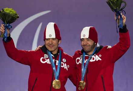 Brian McKeever (right) and his guide and brother Robin are shown celebrating their first gold medal of these Paralympic Games on Monday in the 20-km visual impaired event. They repeated their gold feat on Thursday in the 10-kilometre classic.