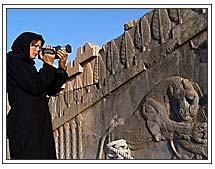 Reporter Jane Kokan shoots an archeological site