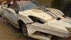 A car being remodelled to look like a crocodile at Godfrey Namunye's vehicle workshop in Kampala, Uganda