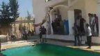 Man jumps into pool