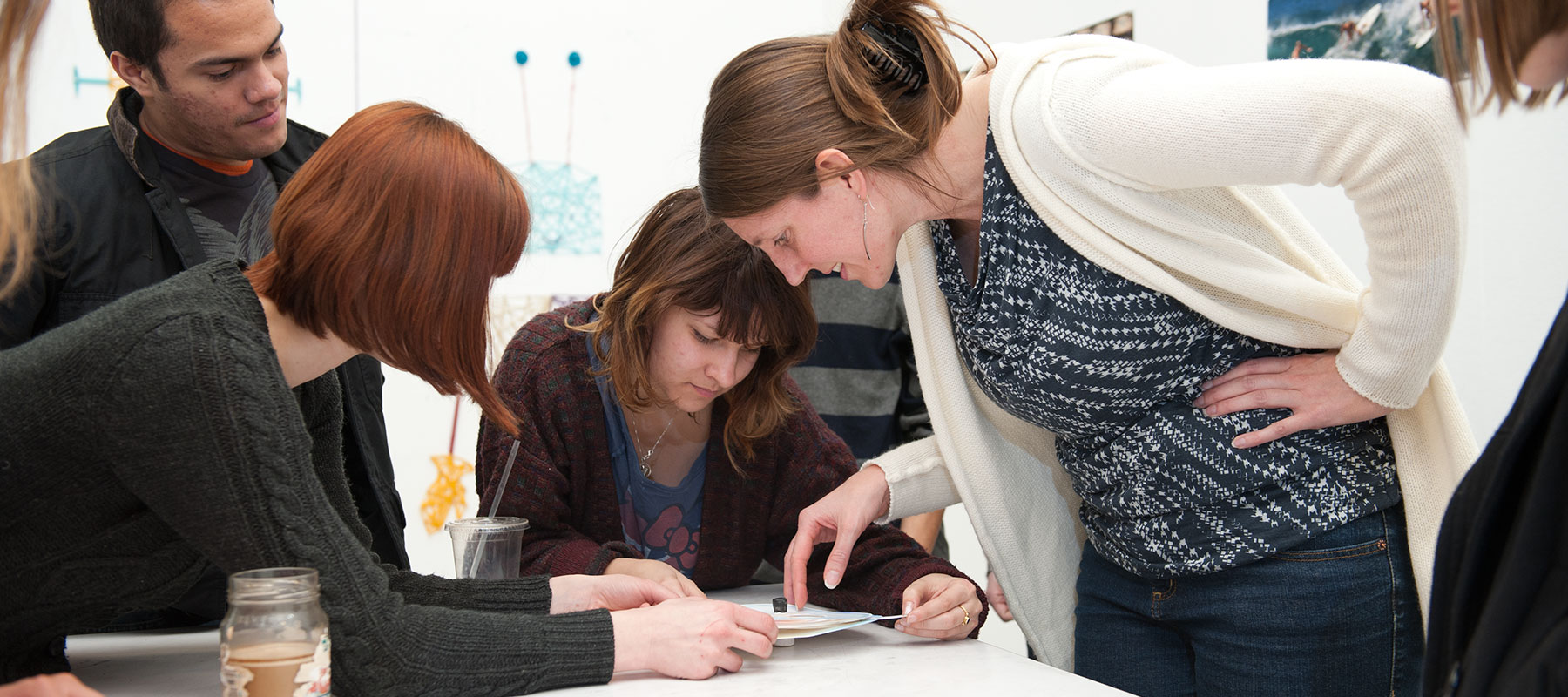 Camille Utterback conducts a critique of a project with her class.