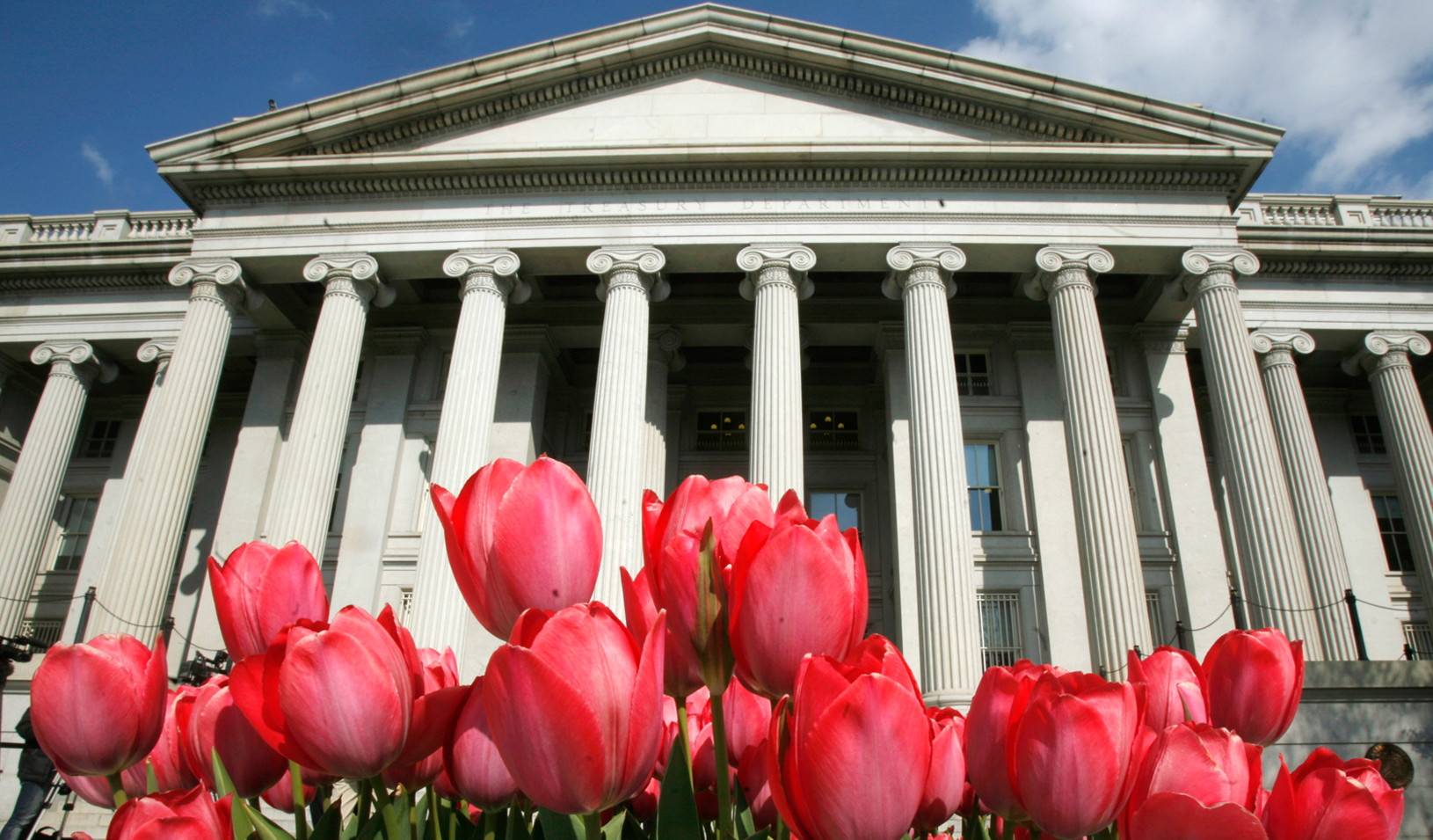 Tulips bloom in front of U.S. Treasury Building in Washington (Reuters photo by Jim Young)