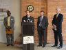 Date: 02/17/2010 Description: From left: Tyrone Shelton, Rep. Brian Higgins (at podium), Rep. Chris Lee, and Doug Swift. - State Dept Image