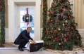 President Obama Opens A Christmas Gift