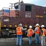 TSA workers with a train