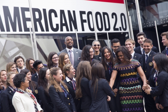 First Lady Michelle Obama is greeted by student ambassadors at Milan World Expo