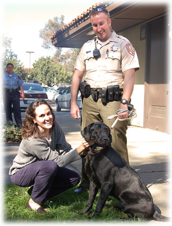 Photo:Chief Laura Wilson with Deputy Adam Cullen and Red.