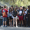 Group of students sitting and talking on the Quad