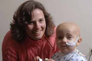 David and his mother Aimee play at Ronald McDonald House in Palo Alto