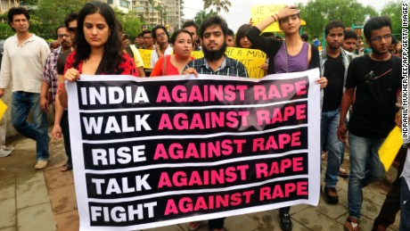 indian Bollywood singer Sona Mohapatra (3L) and actor Sonam Kapoor (3R) take part in a protest march against the gang-rape of a female photographer in Mumbai on August 25, 2013. Mumbai police arrested the fifth and final member of a gang suspected of raping a photographer, a crime that reignited anger about women&#39;s safety in India following a similar attack last year.  