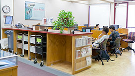 Photo of the individual computers in study carrels in Lane Library 