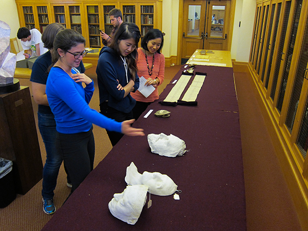 Students examining artifacts