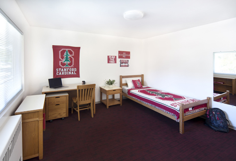 Dorm room decorated with Stanford items