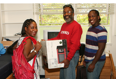 Family helping a student move in