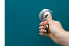photo of key in door knob