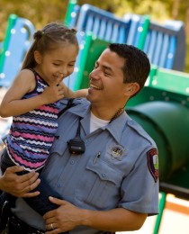 photo of public safety officer with his daughter
