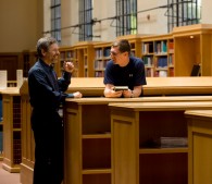 photo of two men in the library