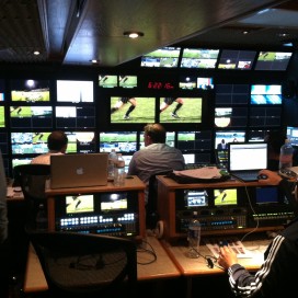 Workers test graphics and camera angles before the Pac-12 Networks' first live event, Stanford's women's soccer home opener against Santa Clara. "We have triple backups," explained Pac-12 Networks Executive Vice President and General Manager Lydia Murphy-Stephens. (JOSEPH BEYDA/The Stanford Daily)