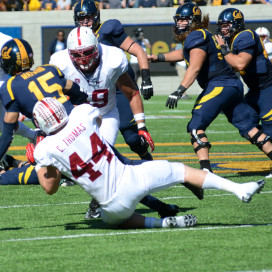 Senior linebacker Chase Thomas (44) and the rest of the Stanford defense had no problem putting pressure on Washington State, but Wazzu nearly pulled off a late comeback before faltering on the final drive of the Cardinal's 24-17 win on Saturday (ROGER CHEN/The Stanford Daily).