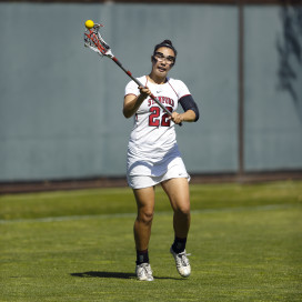 Freshman Julia Burns (above) had three goals, but it wasn't enough for the Cardinal, whose season ended with a 15-8 loss to No. 2 Northwestern. (HECTOR GARCIA-MOLINA/stanfordphoto.com)