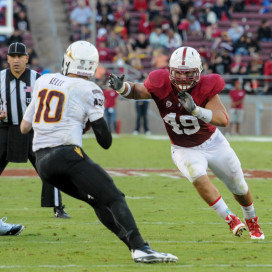 Fifth-year senior defensive end Ben Gardner (49) blocked a punt to help Stanford put the Sun Devils away Saturday. (SIMON WARBY/The Stanford Daily)