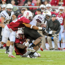 Junior Wayne Lyons (bottom) and fellow corner Alex Carter will be tasked with shutting down the best statistical passing attack in the nation. (SIMON WARBY/The Stanford Daily)