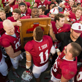 Shayne Skov (center) is clearly happy to have the Axe for a fourth straight year. What are The Daily's football writers thankful for this holiday season? (BOB DREBIN/StanfordPhoto.com)